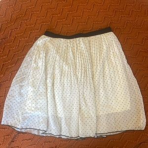 White skirt with black polka dots/hearts